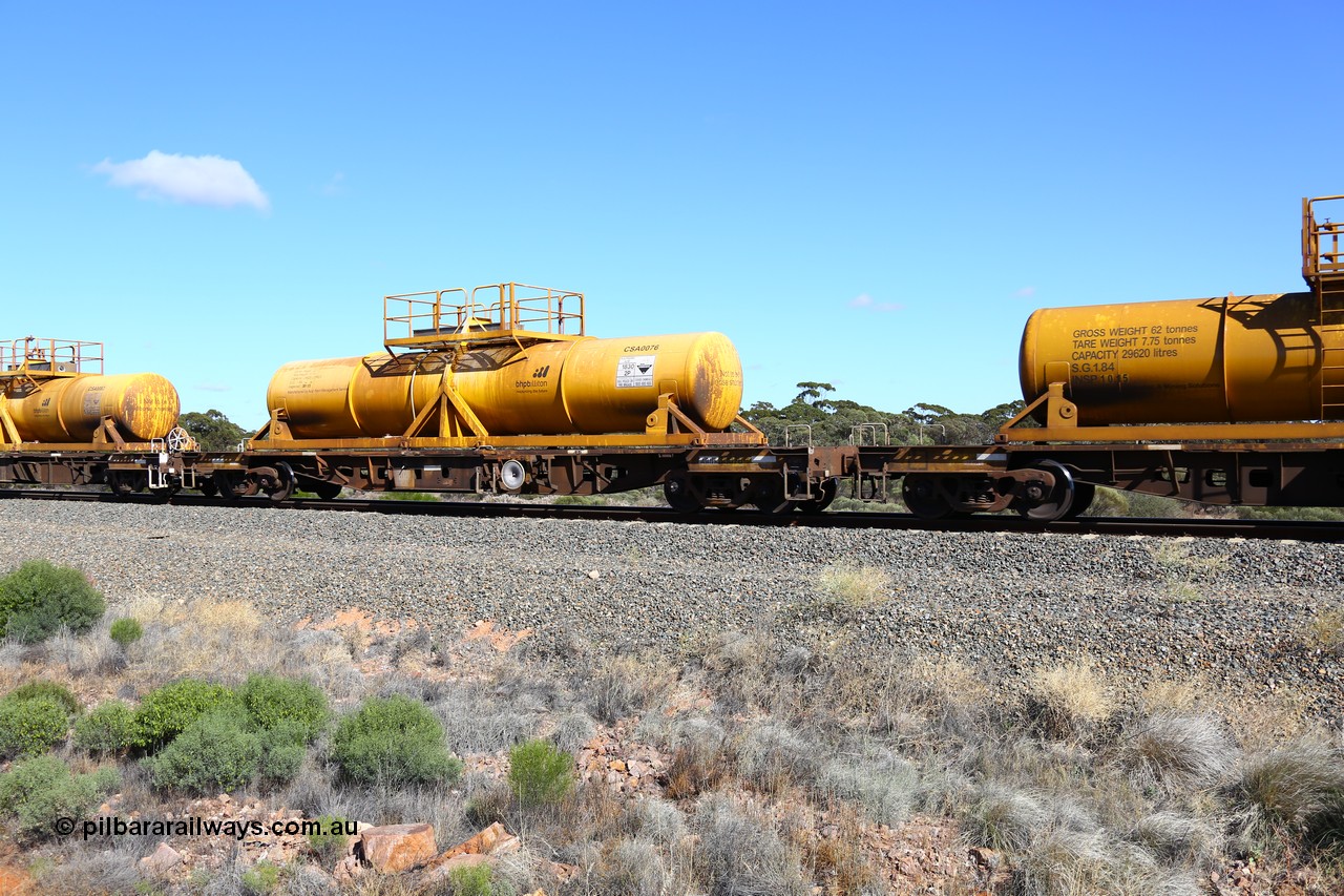 161111 2522
Binduli, Kalgoorlie Freighter train 5025, waggon AQHY 30076 with sulphuric acid tank CSA 0076 type leader of the new CSA tanks built by Acid Plant Management Services. AQHY 30076 was originally built by the WAGR Midland Workshops in 1964/66 as a WF type flat waggon, then in 1997, following several recodes and modifications, was one of seventy five waggons converted to the WQH type to carry CSA sulphuric acid tanks between Hampton/Kalgoorlie and Perth/Kwinana.
Keywords: AQHY-type;AQHY30076;WAGR-Midland-WS;WF-type;WFDY-type;WFDF-type;WQH-type;