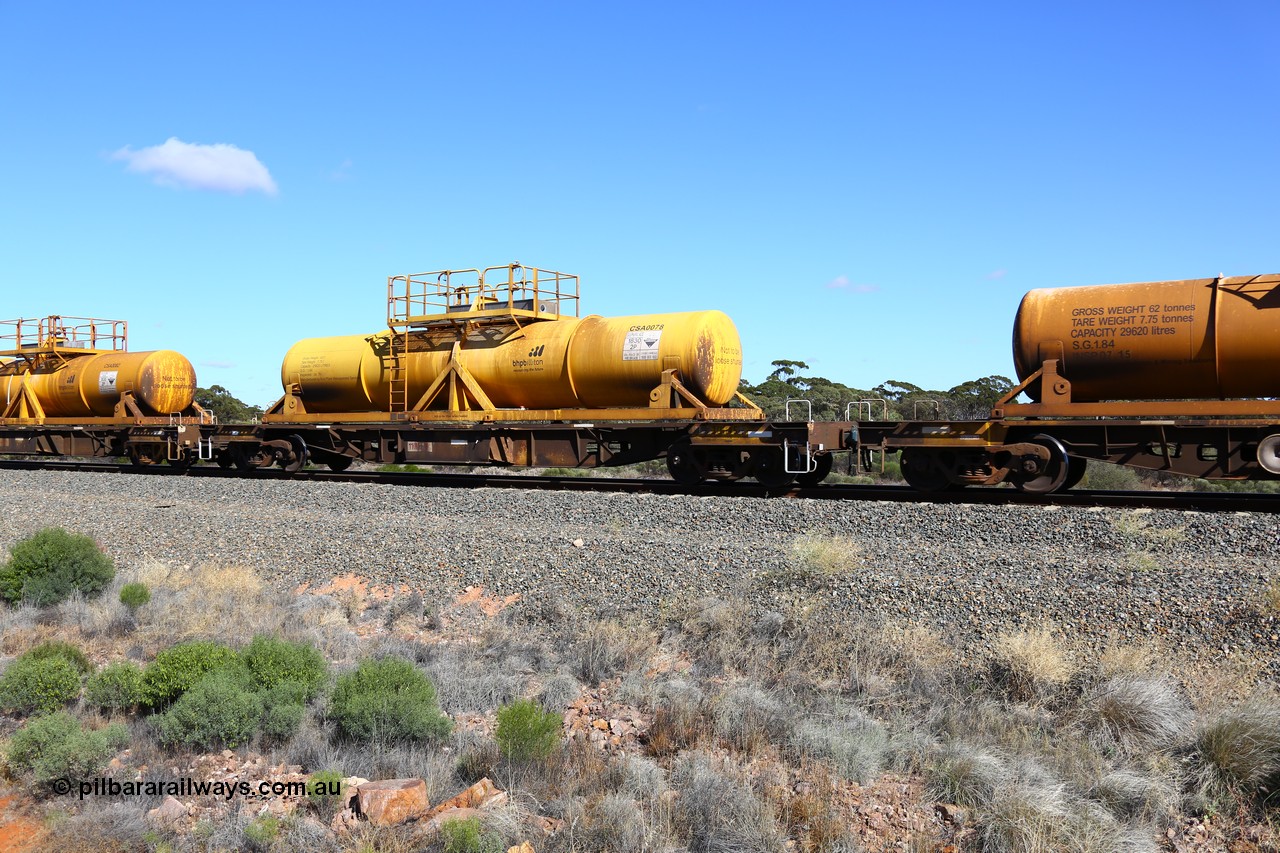 161111 2525
Binduli, Kalgoorlie Freighter train 5025, waggon AQHY 30045 with sulphuric acid tank CSA 0078, originally built by the WAGR Midland Workshops in 1964/66 as a WF type flat waggon, then in 1997, following several recodes and modifications, was one of seventy five waggons converted to the WQH type to carry CSA sulphuric acid tanks between Hampton/Kalgoorlie and Perth/Kwinana.
Keywords: AQHY-type;AQHY30045;WAGR-Midland-WS;WF-type;WFDY-type;WFDF-type;RFDF-type;WQH-type;