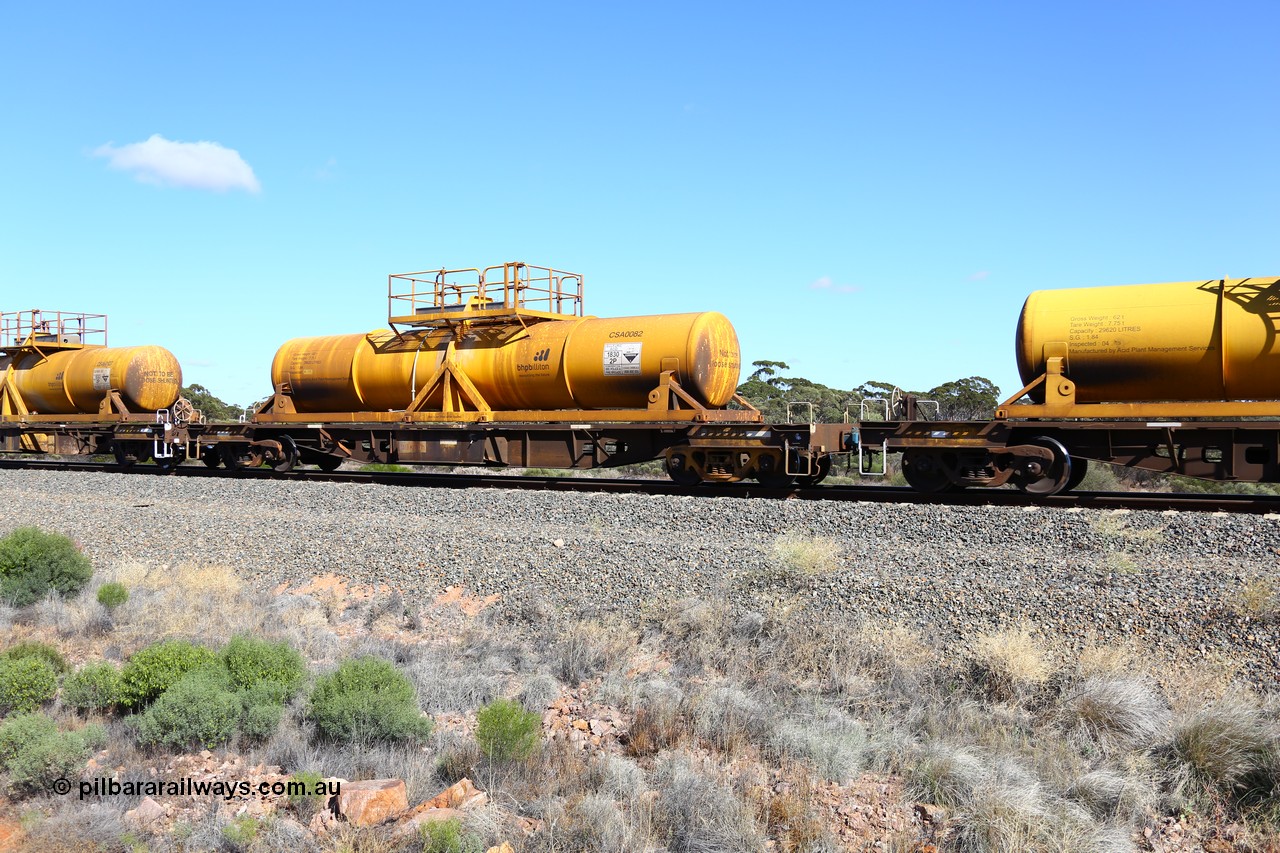 161111 2526
Binduli, Kalgoorlie Freighter train 5025, waggon AQHY 30078 with sulphuric acid tank CSA 0082, originally built by the WAGR Midland Workshops in 1964/66 as a WF type flat waggon, then in 1997, following several recodes and modifications, was one of seventy five waggons converted to the WQH type to carry CSA sulphuric acid tanks between Hampton/Kalgoorlie and Perth/Kwinana.
Keywords: AQHY-type;AQHY30078;WAGR-Midland-WS;WF-type;WFDY-type;WFDF-type;RFDF-type;WQH-type;
