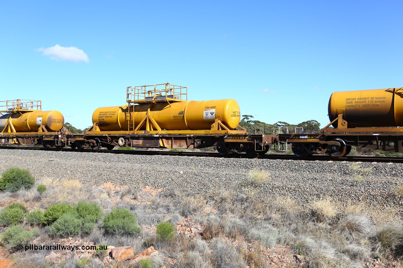 161111 2528
Binduli, Kalgoorlie Freighter train 5025, waggon AQHY 30090 with sulphuric acid tank CSA 0092, originally built by the WAGR Midland Workshops in 1964/66 as a WF type flat waggon, then in 1997, following several recodes and modifications, was one of seventy five waggons converted to the WQH type to carry CSA sulphuric acid tanks between Hampton/Kalgoorlie and Perth/Kwinana.
Keywords: AQHY-type;AQHY30090;WAGR-Midland-WS;WF-type;WFDY-type;WFDF-type;RFDF-type;WQH-type;