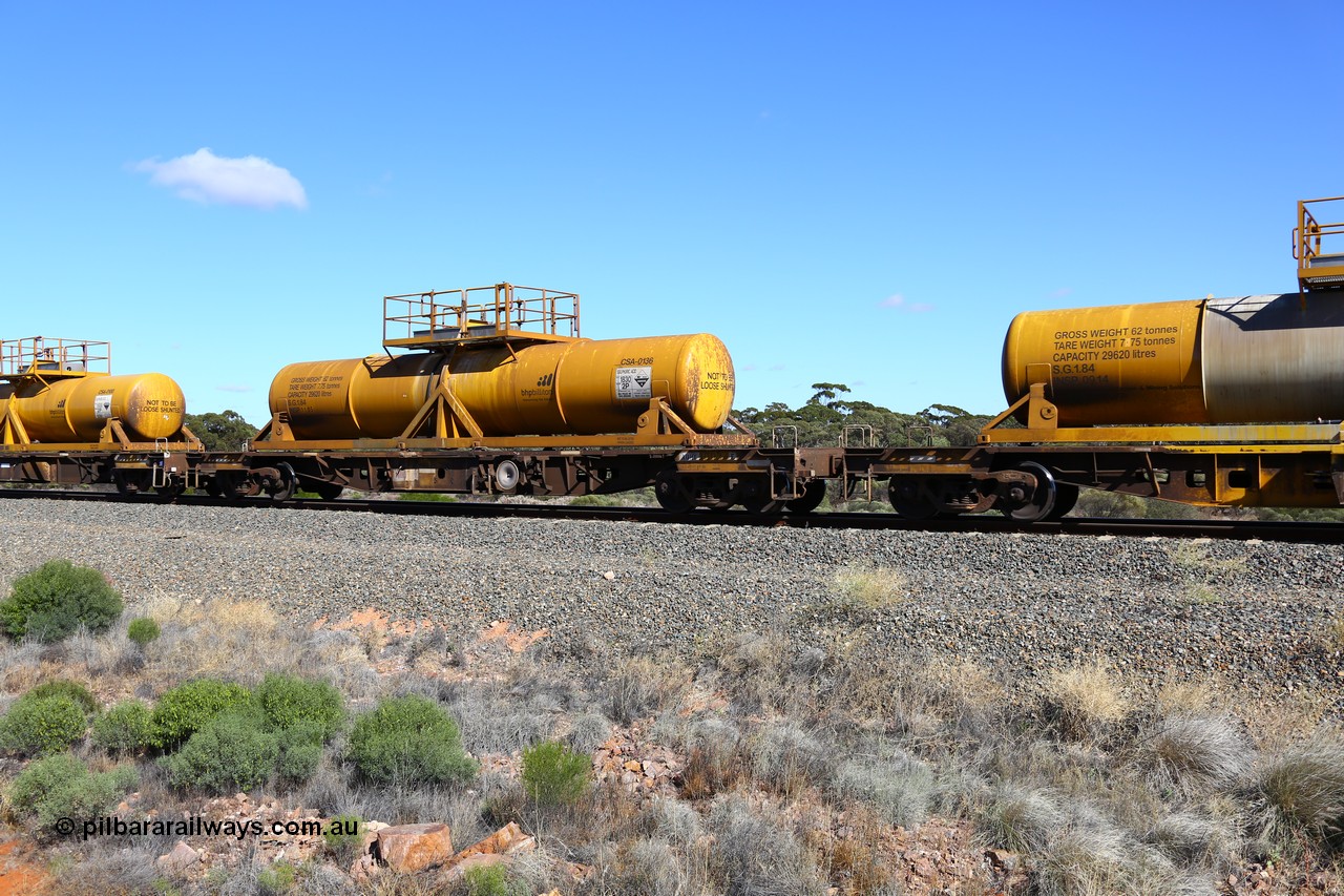 161111 2530
Binduli, Kalgoorlie Freighter train 5025, waggon AQHY 30034 with sulphuric acid tank CSA 0136, originally built by the WAGR Midland Workshops in 1964/66 as a WF type flat waggon, then in 1997, following several recodes and modifications, was one of seventy five waggons converted to the WQH type to carry CSA sulphuric acid tanks between Hampton/Kalgoorlie and Perth/Kwinana.
Keywords: AQHY-type;AQHY30034;WAGR-Midland-WS;WF-type;WFDY-type;WFDF-type;RFDF-type;WQH-type;
