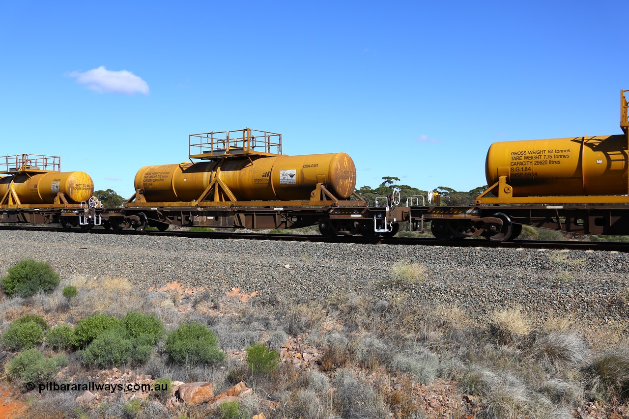 161111 2532
Binduli, Kalgoorlie Freighter train 5025, waggon AQHY 30006 with sulphuric acid tank CSA 0131, originally built by the WAGR Midland Workshops in 1964/66 as a WF type flat waggon, then in 1997, following several recodes and modifications, was one of seventy five waggons converted to the WQH type to carry CSA sulphuric acid tanks between Hampton/Kalgoorlie and Perth/Kwinana.
Keywords: AQHY-type;AQHY30006;WAGR-Midland-WS;WF-type;WMA-type;WFDY-type;WFDF-type;RFDF-type;WQH-type;