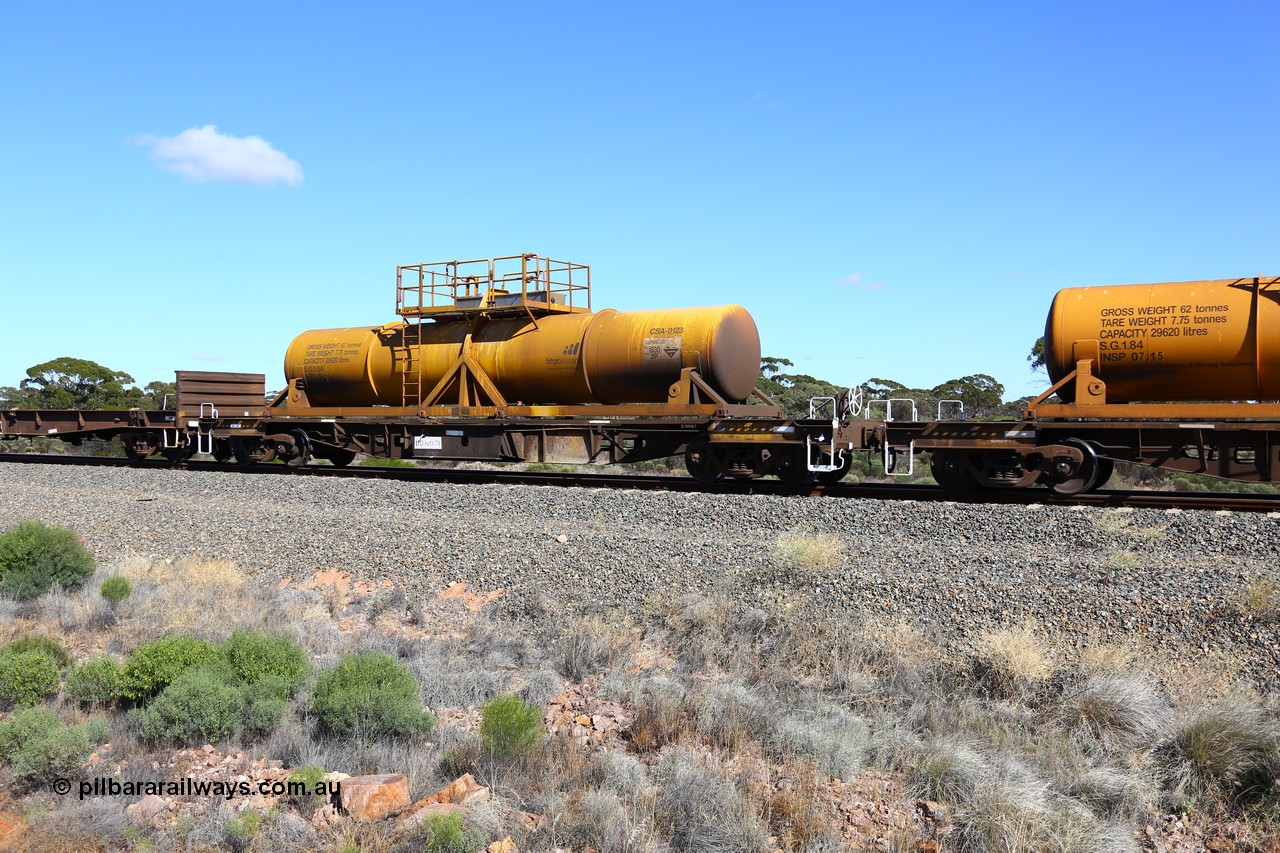 161111 2537
Binduli, Kalgoorlie Freighter train 5025, waggon AQHY 30062 with sulphuric acid tank CSA 0123, originally built by the WAGR Midland Workshops in 1964/66 as a WF type flat waggon, then in 1997, following several recodes and modifications, was one of seventy five waggons converted to the WQH type to carry CSA sulphuric acid tanks between Hampton/Kalgoorlie and Perth/Kwinana.
Keywords: AQHY-type;AQHY30062;WAGR-Midland-WS;WF-type;WFDY-type;WFDF-type;RFDF-type;WQH-type;