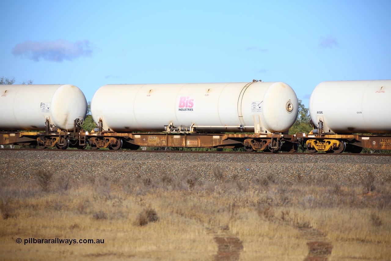 161111 2400
Kalgoorlie, Malcolm freighter train 5029, AZKY type anhydrous ammonia tank waggon AZKY 32237 one of twelve built by Goninan WA in 1998 as type WQK for Murrin Murrin traffic fitted with Bis INDUSTRIES anhydrous ammonia tank A5A.
Keywords: AZKY-type;AZKY32237;Goninan-WA;WQK-type;
