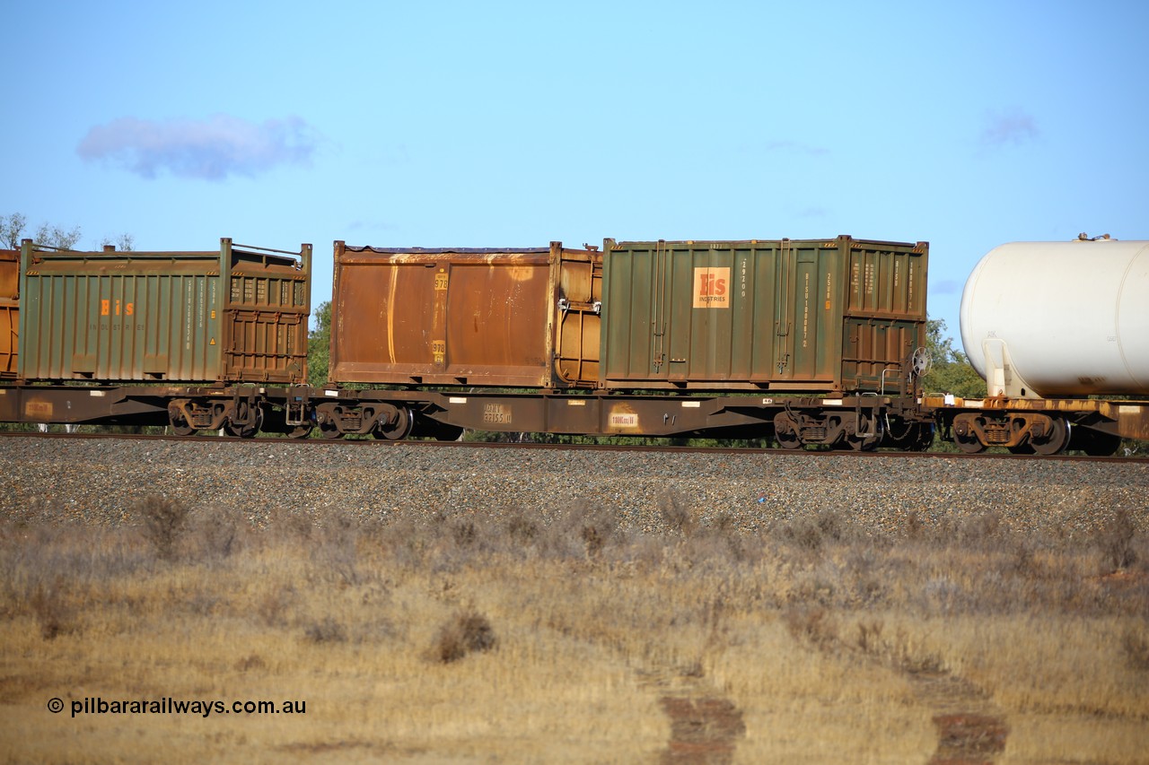 161111 2402
Kalgoorlie, Malcolm freighter train 5029, waggon AQNY 32155 one of sixty two waggons built by Goninan WA in 1998 as WQN type for Murrin Murrin container traffic with a Bis Industries 25U0 type sulphur container BISU 100087 and original style sulphur container S163J 978 with original style door and sliding tarpaulin.
Keywords: AQNY-type;AQNY32155;Goninan-WA;WQN-type;