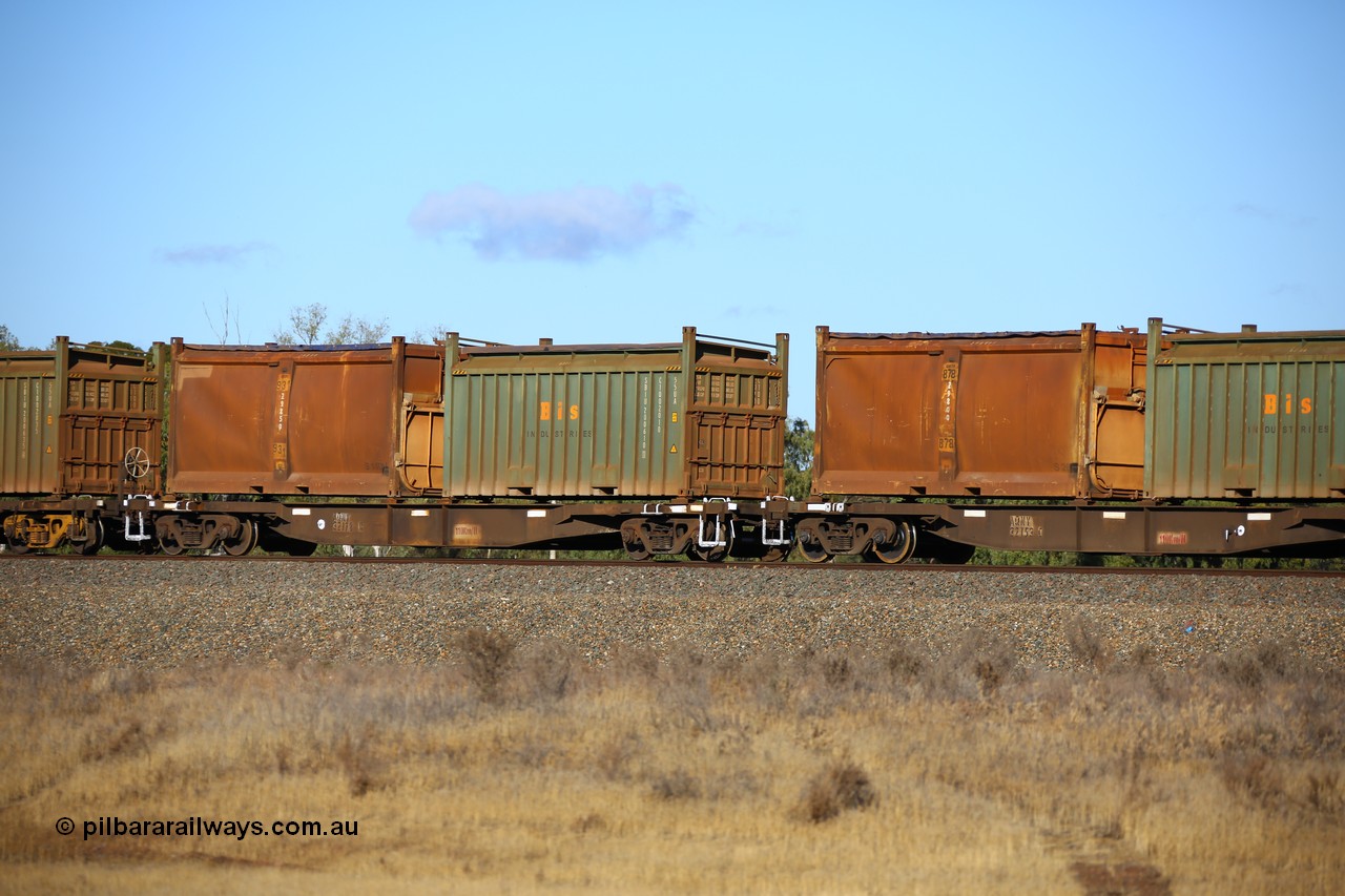 161111 2414
Kalgoorlie, Malcolm freighter train 5029, waggon AQNY 32178 one of sixty two waggons built by Goninan WA in 1998 as WQN type for Murrin Murrin container traffic with a Bis Industries roll-top 55UA type sulphur container 200610 and an original style sulphur container S140M 931 with sliding tarpaulin roof and replacement door.
Keywords: AQNY-type;AQNY32178;Goninan-WA;WQN-type;