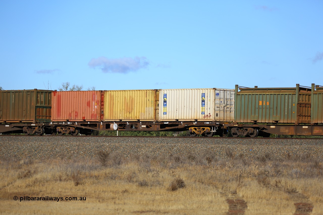 161111 2416
Kalgoorlie, Malcolm freighter train 5029, waggon AQWY 31004, one of eighteen WFA type container waggons built by Westrail Midland Workshops in 1981, carrying three 20' 22G1 type containers, RWLU 214077, RSSU 128484 and XXXU 209747.
Keywords: AQWY-type;AQWY31004;Westrail-Midland-WS;WFA-type;