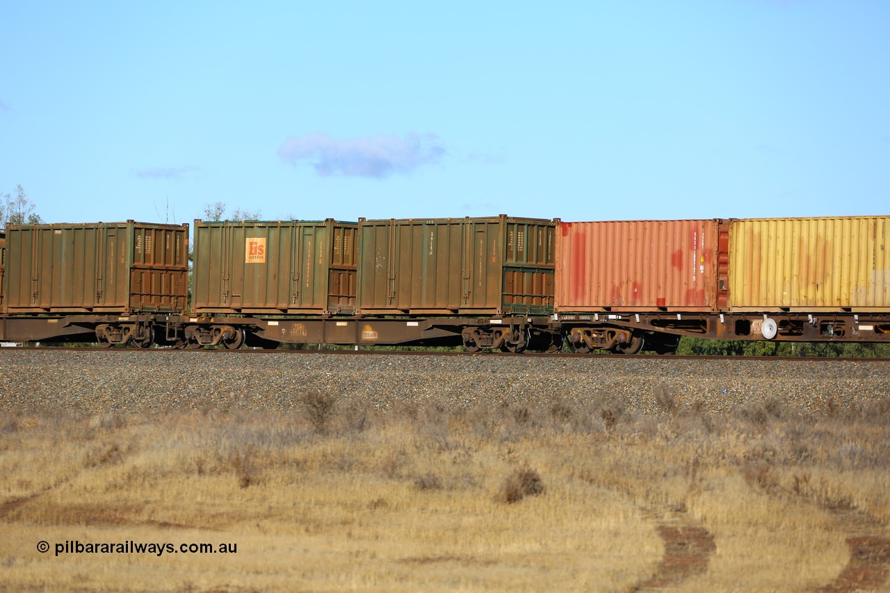 161111 2417
Kalgoorlie, Malcolm freighter train 5029, waggon AQNY 32185 one of sixty two waggons built by Goninan WA in 1998 as WQN type for Murrin Murrin container traffic with two Bis Industries hard-top 25U0 type sulphur containers, undecorated BISU 100017 and decaled BISU 100094.
Keywords: AQNY-type;AQNY32185;Goninan-WA;WQN-type;