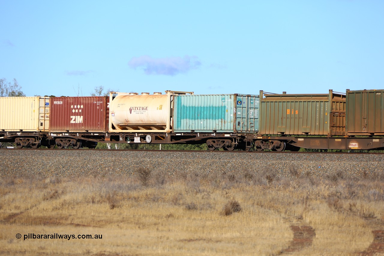161111 2420
Kalgoorlie, Malcolm freighter train 5029, waggon AQWY 30377 originally built by Tomlinson Steel WA as WFX type in 1970 from a batch of 161 carrying three TEU with two being 22G1 type 20' containers RSSU 211680 and ZIMU 283192 and a 20' 25N8 type tanktainer VRHU 002607 for Vintage Road Haulage.
Keywords: AQWY-type;AQWY30377;Tomlinson-Steel-WA;WFX-type;
