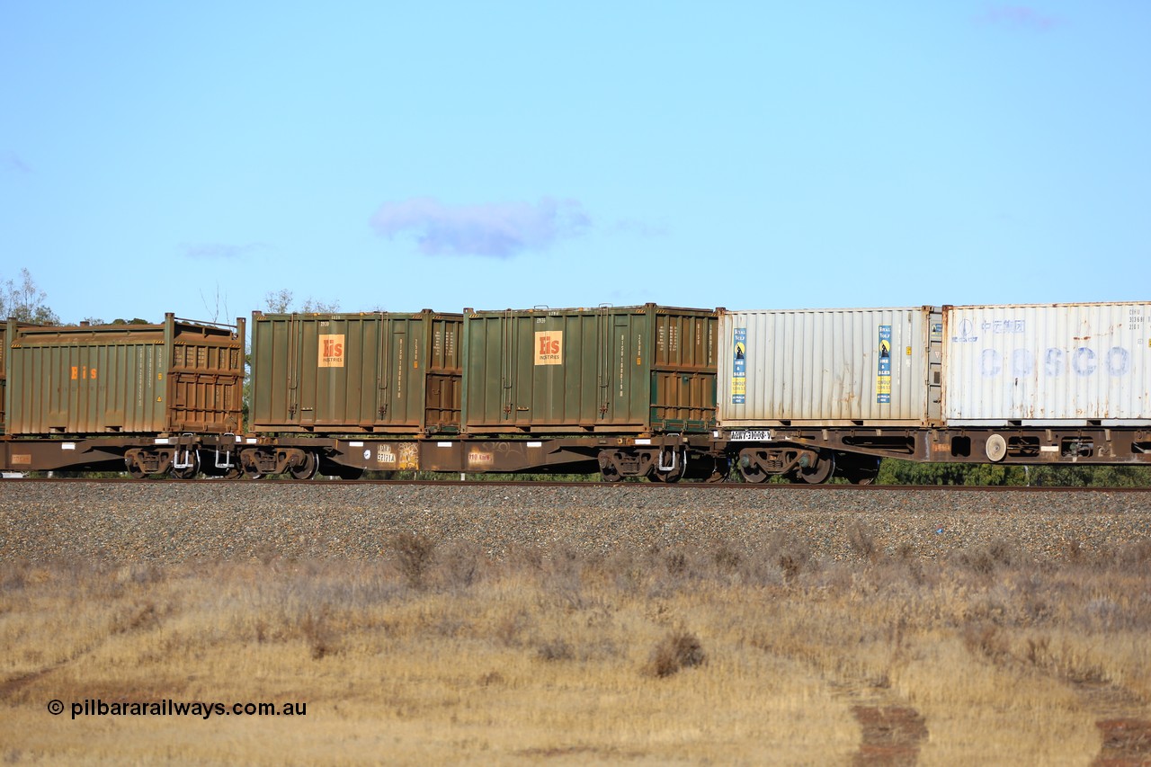 161111 2422
Kalgoorlie, Malcolm freighter train 5029, waggon AQNY 32171 one of sixty two waggons built by Goninan WA in 1998 as WQN type for Murrin Murrin container traffic with a pair of Bis Industries hard-top 25U0 type sulphur containers BISU 100079 and BISU 100083.
Keywords: AQNY-type;AQNY32171;Goninan-WA;WQN-type;
