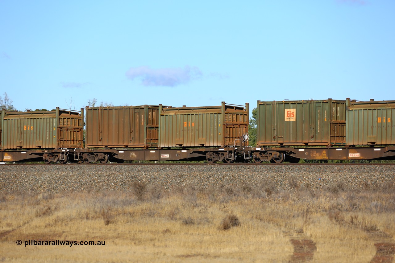 161111 2426
Kalgoorlie, Malcolm freighter train 5029, waggon AQNY 32177 one of sixty two waggons built by Goninan WA in 1998 as WQN type for Murrin Murrin container traffic with a Bis Industries roll-top 55UA type sulphur container SBIU 200622 and an undecorated Bis Industries hard-top 25U0 type sulphur container BISU 100072.
Keywords: AQNY-type;AQNY32177;Goninan-WA;WQN-type;