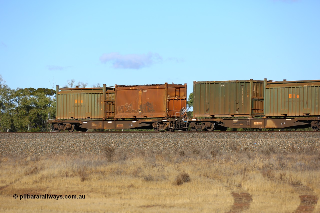 161111 2429
Kalgoorlie, Malcolm freighter train 5029, waggon AQNY 32204 one of sixty two waggons built by Goninan WA in 1998 as WQN type for Murrin Murrin container traffic with an original style sulphur container S77A 954 with original style door and sliding tarpaulin and a Bis Industries roll-top 55UA type sulphur container SBIU 200600.
Keywords: AQNY-type;AQNY32204;Goninan-WA;WQN-type;