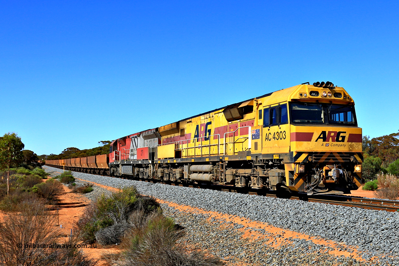 240328 2794
Hampton, Aurizon operated Mineral Resources empty Mount Walton iron ore train #5040 is powered by AC class locomotive AC 4303 and sill in original ARG livery. AC 4303 with serial number R0006-04 / 09-374 in a GE C43ACi model built by UGL Rail NSW in 2009 in an order for eight AC class units placed by QRN/ARG. Seen here March 28, 2024.
Keywords: AC-class;AC4303;UGL-Rail-NSW;GE;C43ACi;R0006-04/09-374;