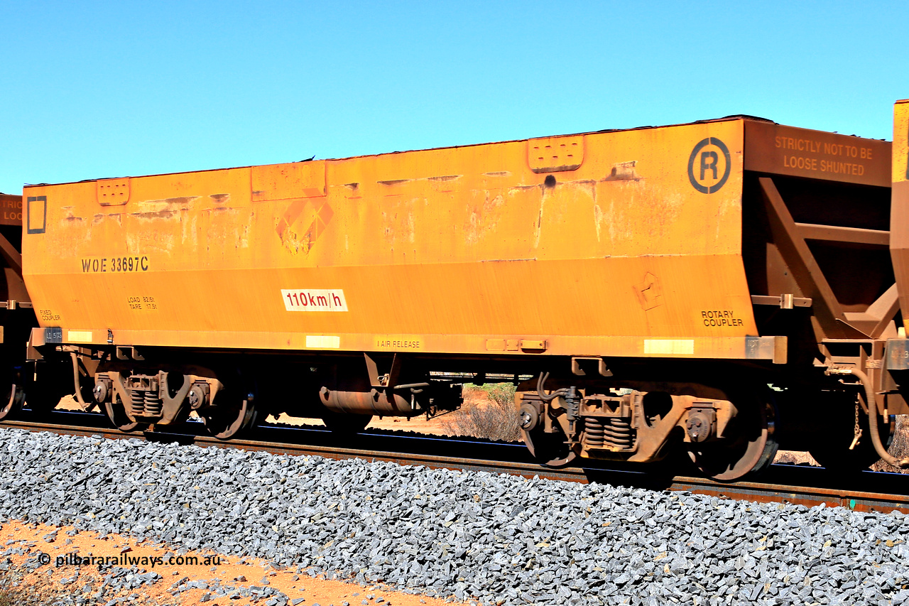 240328 2832
WOE type iron ore waggon WOE 33697 is from a batch of two hundred and twenty seven built by UGL Rail WA between from 08-2011 and 02-2012 of the current style of 82.5 tonne load capacity WOE class waggons and had fleet number 7108 before the Aurizon yellow sides and logos, in Mineral Resources traffic 5040 empty Mount Walton iron ore train. March 28, 2024.
Keywords: WOE-type;WOE33697;UGL-Rail-WA;R0067-109;