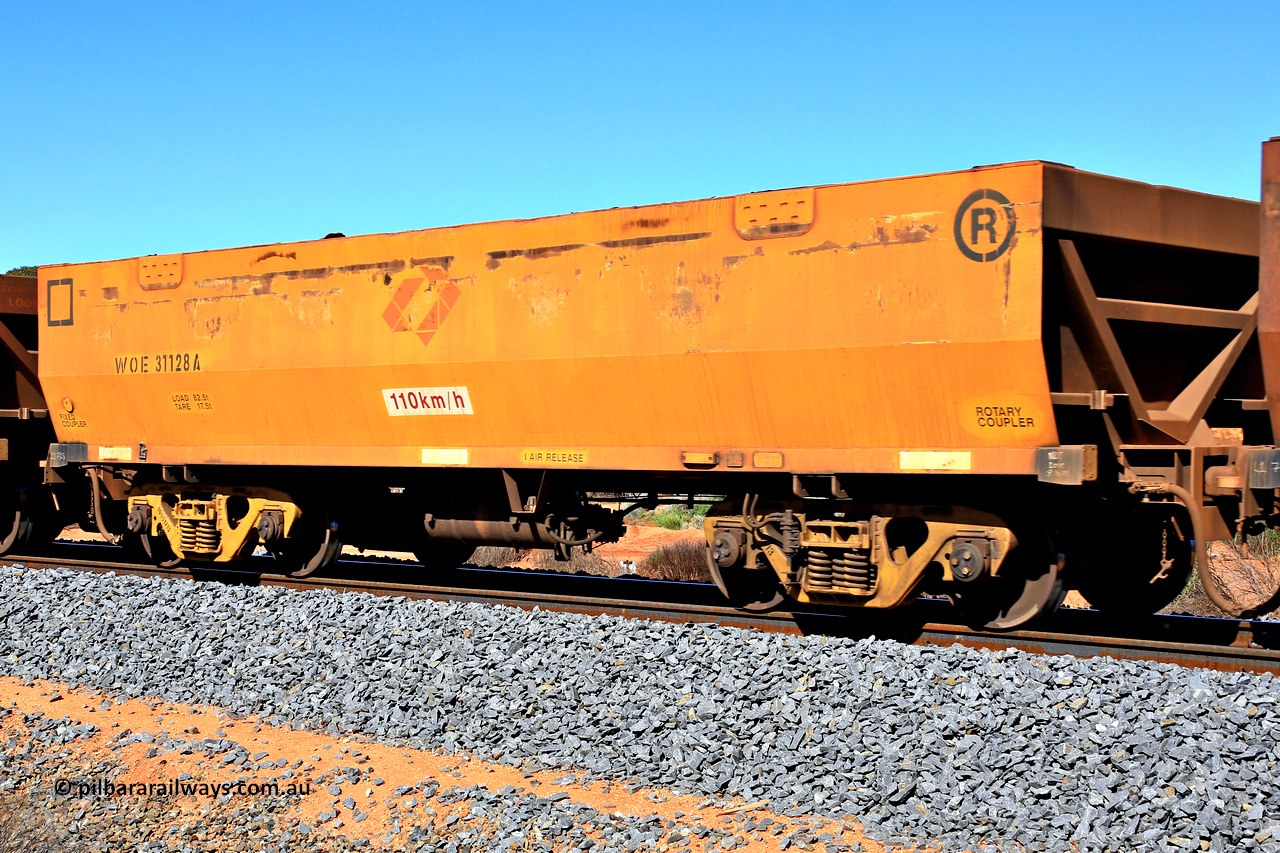 240328 2837
WOE type iron ore waggon WOE 31128 is one of a batch of one hundred and thirty built by Goninan WA between March and August 2001 with serial number 950092-118 and was fleet number 710 before the Aurizon yellow painted sides and logo, in Mineral Resources traffic 5040 empty Mount Walton iron ore train. March 28, 2024.
Keywords: WOE-type;WOE31128;Goninan-WA;950092-118;