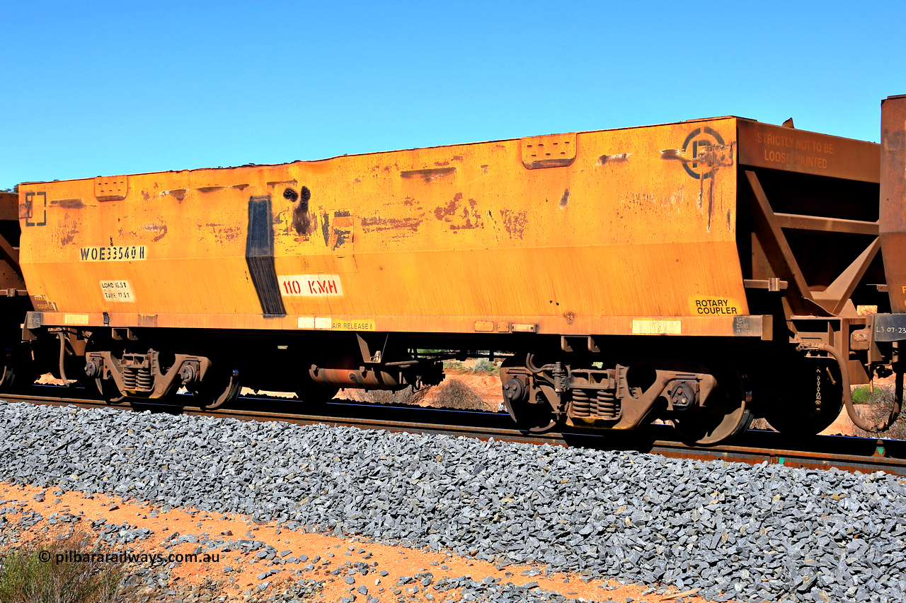 240328 2884
WOE type iron ore waggon WOE 33540 is one of a batch of one hundred and twenty eight built by United Group Rail WA between August 2008 and March 2009 with serial number 950211-080 and was fleet number 9035 prior to the Aurizon yellow repainting of the sides, in Mineral Resources traffic 5040 empty Mount Walton iron ore train. March 28, 2024.
Keywords: WOE-type;WOE33540;United-Group-Rail-WA;950211-080;