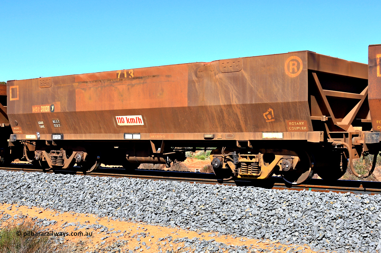 240328 2898
WOE type iron ore waggon WOE 31131 is one of a batch of one hundred and thirty built by Goninan WA between March and August 2001 with serial number 950092-121 and fleet number 713, in Mineral Resources traffic 5040 empty Mount Walton iron ore train. March 28, 2024.
Keywords: WOE-type;WOE31131;Goninan-WA;950092-121;