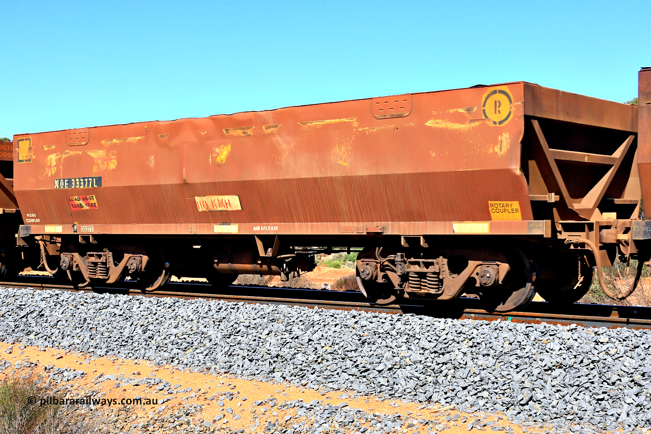 240328 2935
WOE type iron ore waggon WOE 33377 is one of a batch of one hundred and forty one built by United Goninan WA between November 2005 and April 2006 with serial number 950142-082 and had fleet number 876. Sides have been repainted brown. In Mineral Resources traffic 5040 empty Mount Walton iron ore train. March 28, 2024.
Keywords: WOE-type;WOE33377;United-Goninan-WA;950142-082;