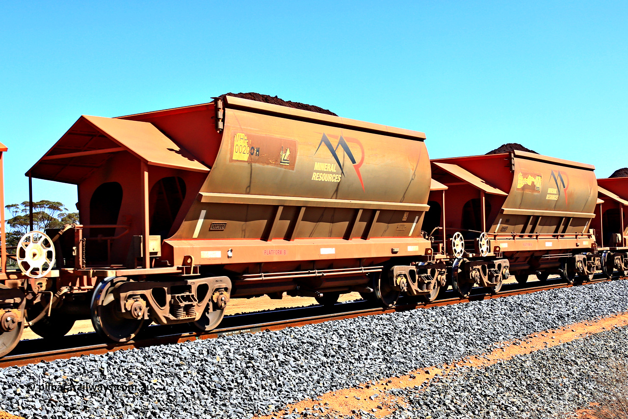 240328 2973
Loaded Koolyanobbing iron ore train 5041 with Mineral Resources Ltd MHPY type iron ore waggons MHPY 00200 and MHPY 00199 built by CSR Yangtze Co China with serial numbers 2014 / 382-200 and 2014 / 382-200 in 2014 as a batch of 382 pairs, these bottom discharge hopper waggons are operated in 'married' pairs. March 28, 2024.
Keywords: MHPY-type;MHPY00200;2014/382-200;MHPY00199;2014/382-199;CSR-Yangtze-Rolling-Stock-Co-China;