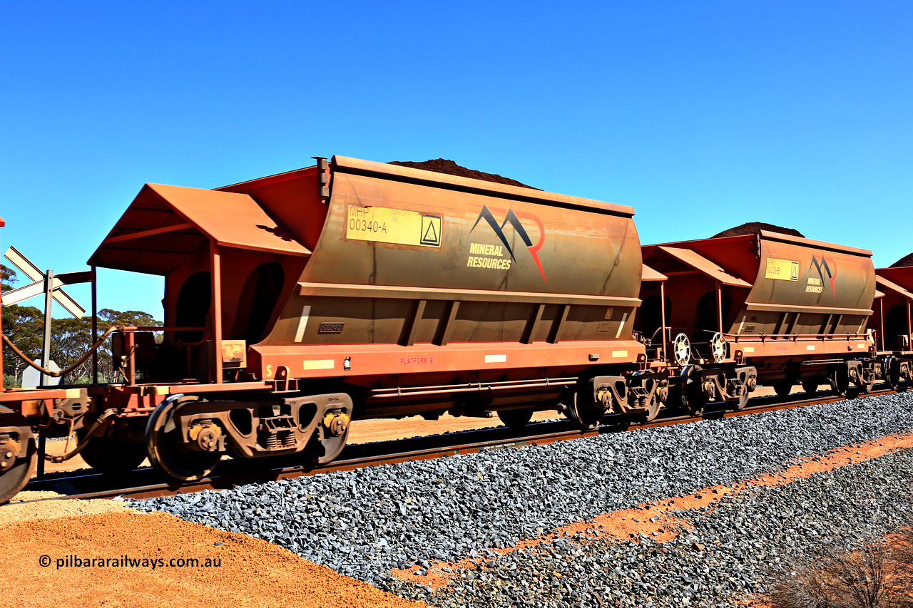 240328 2976
Loaded Koolyanobbing iron ore train 5041 with Mineral Resources Ltd MHPY type iron ore waggons MHPY 00340 and MHPY 00339 built by CSR Yangtze Co China with serial numbers 2014 / 382-340 and 2014 / 382-339 in 2014 as a batch of 382 pairs, these bottom discharge hopper waggons are operated in 'married' pairs. March 28, 2024.
Keywords: MHPY-type;MHPY00340;2014/382-340;MHPY00339;2014/382-339;CSR-Yangtze-Rolling-Stock-Co-China;