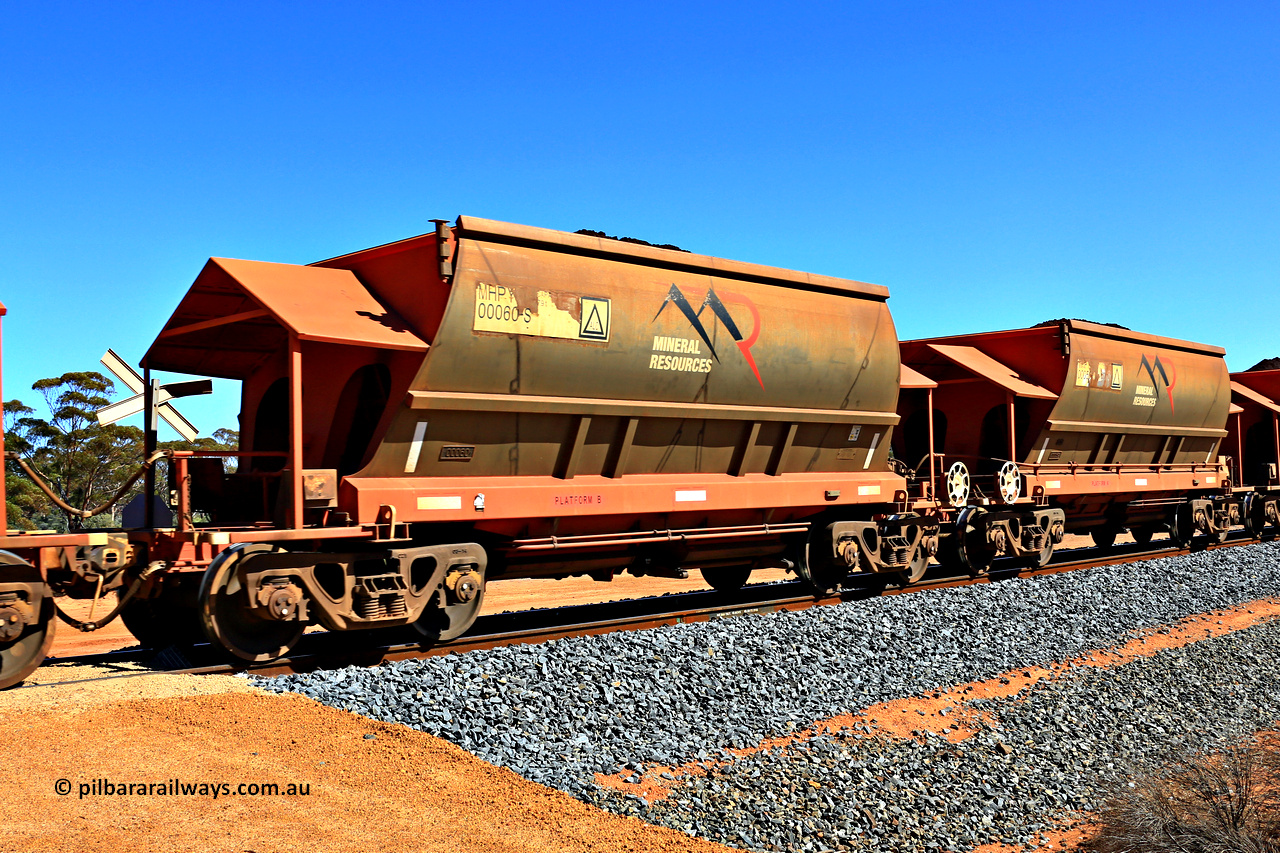 240328 2980
Loaded Koolyanobbing iron ore train 5041 with Mineral Resources Ltd MHPY type iron ore waggons MHPY 00060 and MHPY 00059 built by CSR Yangtze Co China with serial numbers 2014 / 382-60 and 2014 / 382-59 in 2014 as a batch of 382 pairs, these bottom discharge hopper waggons are operated in 'married' pairs. March 28, 2024.
Keywords: MHPY-type;MHPY00060;2014/382-60;MHPY00059;2014/382-59;CSR-Yangtze-Rolling-Stock-Co-China;