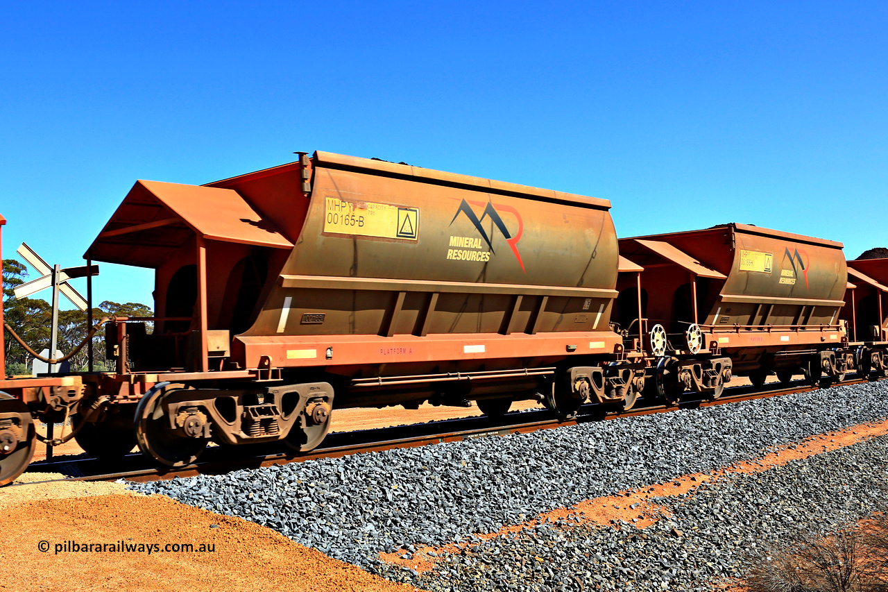 240328 2981
Loaded Koolyanobbing iron ore train 5041 with Mineral Resources Ltd MHPY type iron ore waggons MHPY 00165 and MHPY 00166 built by CSR Yangtze Co China with serial numbers 2014 / 382-165 and 2014 / 382-166 in 2014 as a batch of 382 pairs, these bottom discharge hopper waggons are operated in 'married' pairs. March 28, 2024.
Keywords: MHPY-type;MHPY00165;2014/382-165;MHPY00166;2014/382-166;CSR-Yangtze-Rolling-Stock-Co-China;