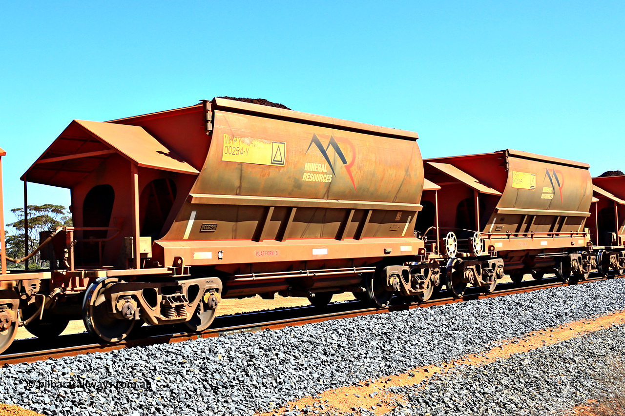 240328 2982
Loaded Koolyanobbing iron ore train 5041 with Mineral Resources Ltd MHPY type iron ore waggons MHPY 00254 and MHPY 00253 built by CSR Yangtze Co China with serial numbers 2014 / 382-254 and 2014 / 382-253 in 2014 as a batch of 382 pairs, these bottom discharge hopper waggons are operated in 'married' pairs. March 28, 2024.
Keywords: MHPY-type;MHPY00254;2014/382-254;MHPY00253;2014/382-253;CSR-Yangtze-Rolling-Stock-Co-China;