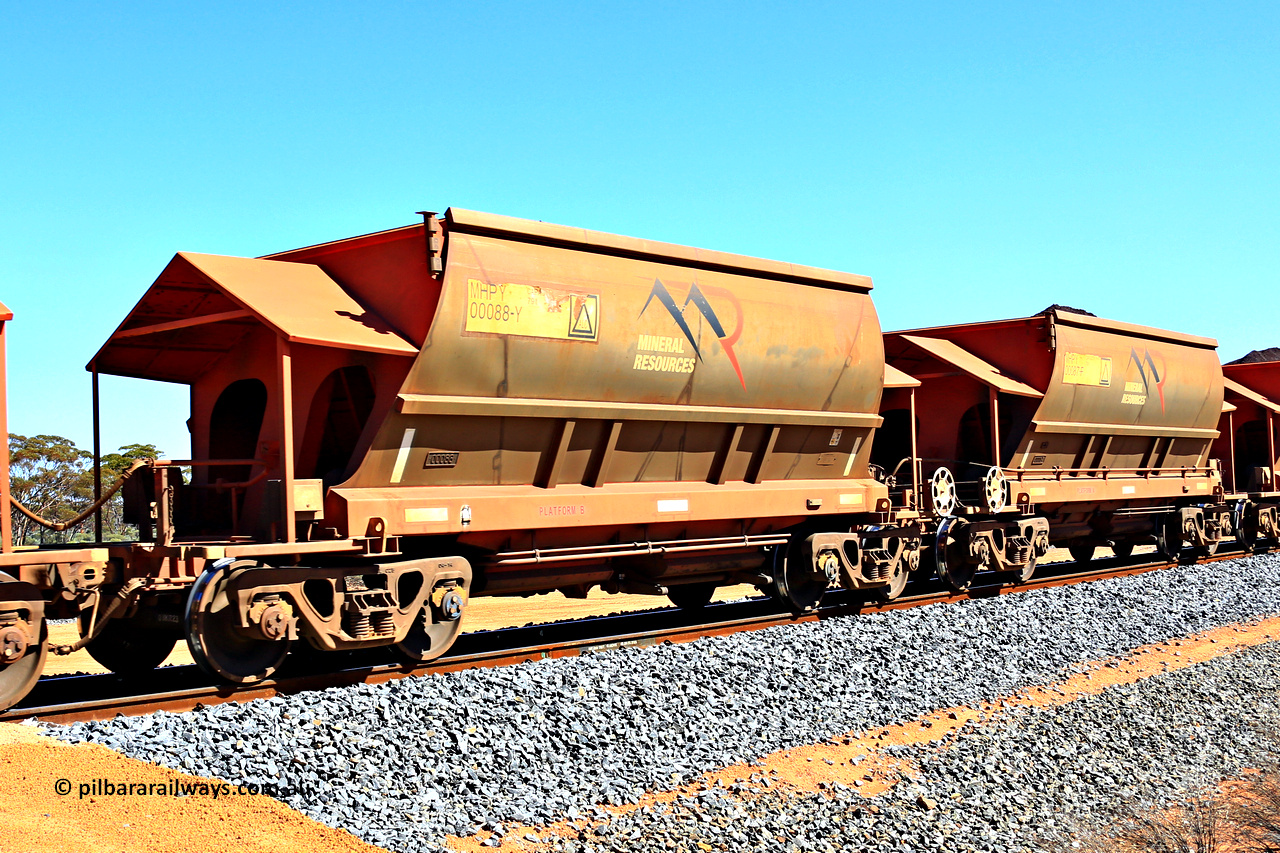 240328 2983
Loaded Koolyanobbing iron ore train 5041 with Mineral Resources Ltd MHPY type iron ore waggons MHPY 00088 and MHPY 00087 built by CSR Yangtze Co China with serial numbers 2014 / 382-88 and 2014 / 382-87 in 2014 as a batch of 382 pairs, these bottom discharge hopper waggons are operated in 'married' pairs. March 28, 2024.
Keywords: MHPY-type;MHPY00088;2014/382-88;MHPY00087;2014/382-87;CSR-Yangtze-Rolling-Stock-Co-China;