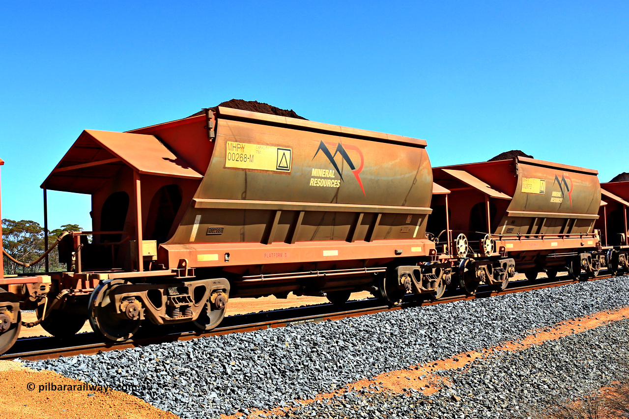 240328 2987
Loaded Koolyanobbing iron ore train 5041 with Mineral Resources Ltd MHPY type iron ore waggons MHPY 00268 and MHPY 00267 built by CSR Yangtze Co China with serial numbers 2014 / 382-268 and 2014 / 382-267 in 2014 as a batch of 382 pairs, these bottom discharge hopper waggons are operated in 'married' pairs. March 28, 2024.
Keywords: MHPY-type;MHPY00268;2014/382-268;MHPY00267;2014/382-267;CSR-Yangtze-Rolling-Stock-Co-China;