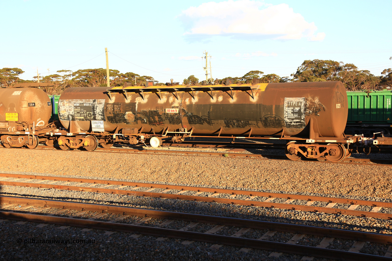 240328 3173
West Kalgoorlie, Viva Energy's NTBF 6121 fuel tank waggon, built by Comeng NSW in 1975 as SCA type SCA 272 for Shell Bitumen, fitted with conventional couplers with a diesel capacity of 62,700 litres, on Pacific National's train 5445 empty fuel to Esperance. March 28, 2024.
Keywords: NTBF-type;NTBF6121;Comeng-NSW;SCA-type;SCA272;NTAF-type;