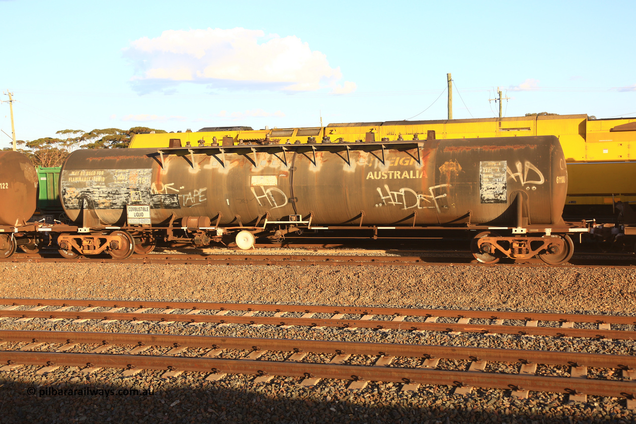 240328 3175
West Kalgoorlie, Viva Energy's NTBF type fuel tank waggon NTBF 6118, with former owners name (Freight Australia) visible. Originally built by Comeng NSW in 1975 as an SCA type 69,000 litre bitumen tanker SCA 267 for Shell NSW. Old code NTAF 6118 U is also visible with conventional couplers, Pacific National's 5445 empty fuel train to Esperance. March 28.2024.
Keywords: NTBF-type;NTBF6118;Comeng-NSW;SCA-type;SCA267;NTAF-type;