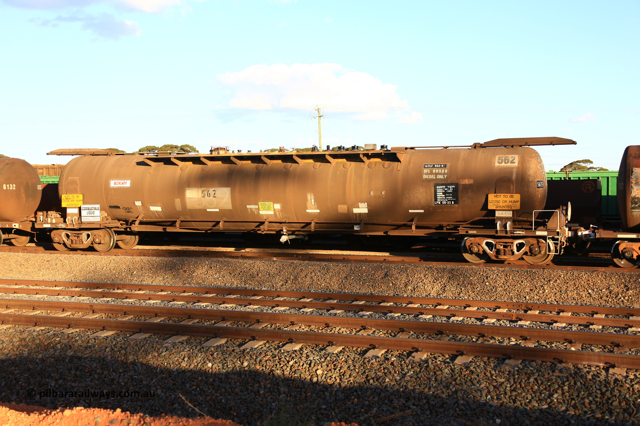 240328 3178
West Kalgoorlie, Viva Energy's ATLF type fuel tank waggon ATLF 562 tank waggon, built by WAGR Midland Workshops in 1973 for Shell as a WJL type with a 86,4900 kL one compartment one dome capacity. Current safe fill level of 80,500 litres, fitted with type F InterLock couplers. Pacific National's 5445 empty fuel train to Esperance. March 28.2024.
Keywords: ATLF-type;ATLF562;WAGR-Midland-WS;WJL-type;