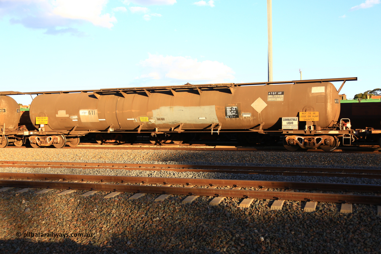 240328 3186
West Kalgoorlie, Viva Energy's ATQF type fuel tank waggon ATQF 611, built by Indeng Qld 1982, in a batch of two, for Shell as type WJQ, 79,340 litre, one compartment one dome, fitted with type F InterLock couplers. Indeng name still visible at far end. Safe fill level of 72,000 litres. Pacific National empty fuel train 5445 to Esperance. March 28, 2024.
Keywords: ATQF-type;ATQF611;Indeng-Qld;WJQ-type;