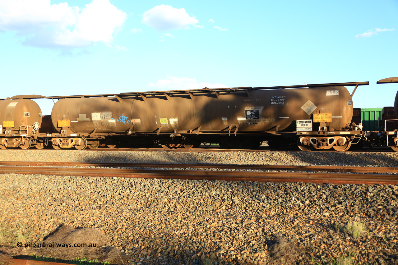 240328 3192
West Kalgoorlie, Viva Energy's ATQF type fuel tank waggon ATQF 612, built by Indeng Qld 1982, in a batch of two, for Shell as type WJQ, 79,340 litre, one compartment one dome, fitted with type F InterLock couplers. Shell Fleet No. TR721 still visible and Indeng builders plate visible at the far end. Safe fill level of 72,000 litres. Pacific National empty fuel train 5445 to Esperance. March 28, 2024.
Keywords: ATQF-type;ATQF612;Indeng-Qld;WJQ-type;
