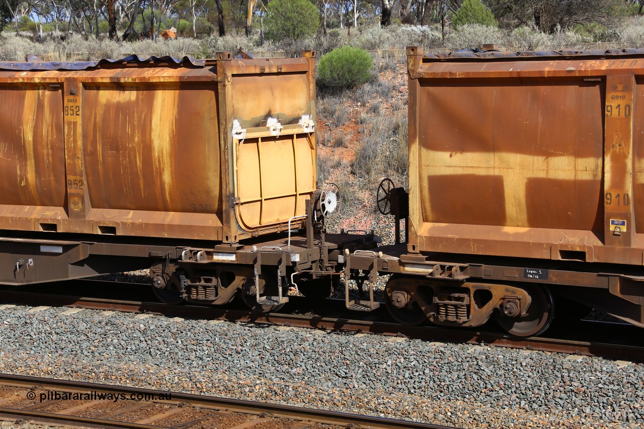 161112 2991
West Kalgoorlie, loaded Malcolm sulphur train 6029, AQNY type waggon AQNY 32165 one of sixty two waggons built by Goninan WA in 1998 as WQN type for Murrin Murrin container traffic, detail view of handbrake end and door detail on sulphur container S34K G852.
Keywords: AQNY-type;AQNY32165;Goninan-WA;WQN-type;