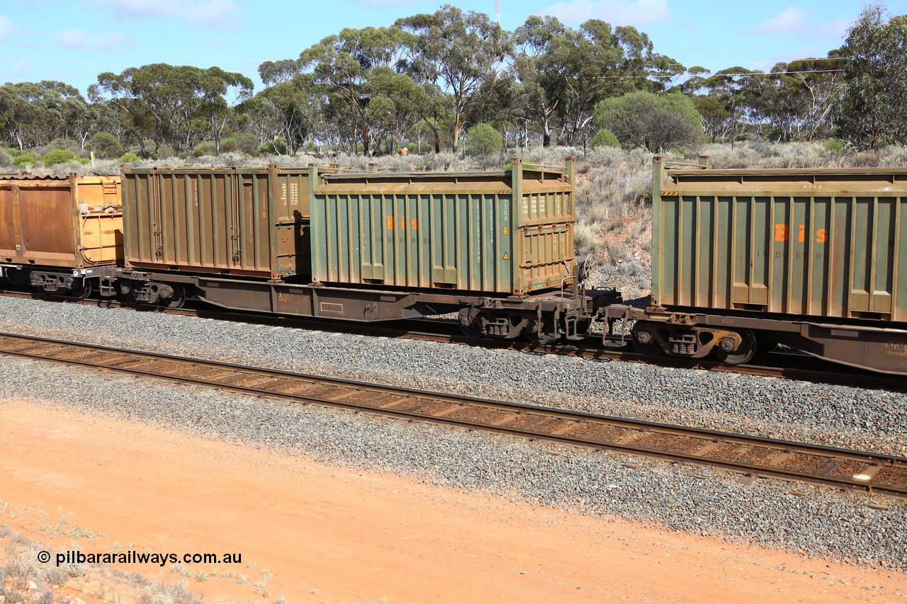 161112 2998
West Kalgoorlie, loaded Malcolm sulphur train 6029, AQNY type waggon AQNY 32175 one of sixty two waggons built by Goninan WA in 1998 as WQN type for Murrin Murrin container traffic with a Bis Industries roll-top type UA55 container SBIU 200626 and an un-decaled hard-top type 25U0 container BISU 100057.
Keywords: AQNY-type;AQNY32175;Goninan-WA;WQN-type;