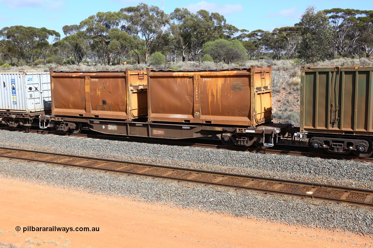 161112 3009
West Kalgoorlie, loaded Malcolm sulphur train 6029, AQNY type waggon AQNY 32174 one of sixty two waggons built by Goninan WA in 1998 as WQN type for Murrin Murrin container traffic with a pair of original style sulphur containers with sliding tarpaulins, S144C G919 and S17V G907.
Keywords: AQNY-type;AQNY32174;Goninan-WA;WQN-type;