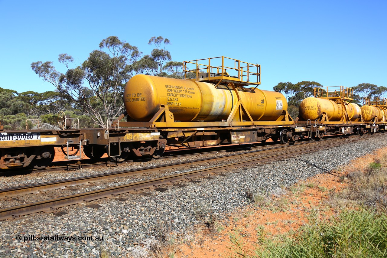 161112 3452
Binduli, loaded Hampton acid train 7406 with AQHY 30095 with sulphuric acid tank CSA 0125, originally built by the WAGR Midland Workshops in 1964/66 as a WF type flat waggon, then in 1997, following several recodes and modifications, was one of seventy five waggons converted to the WQH type to carry CSA sulphuric acid tanks between Hampton/Kalgoorlie and Perth/Kwinana. CSA 0125 was built by Vcare Engineering, India for Access Petrotec & Mining Solutions.
Keywords: AQHY-type;AQHY30095;WAGR-Midland-WS;WF-type;WFP-type;WFDY-type;WFDF-type;RFDF-type;WQH-type;