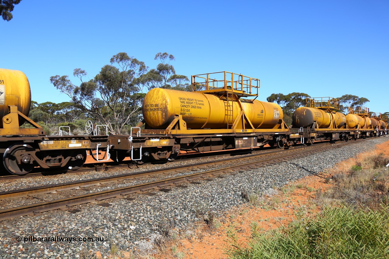 161112 3464
Binduli, loaded Hampton acid train 7406 with AQHY 30077 with sulphuric acid tank CSA 0116, originally built by the WAGR Midland Workshops in 1964/66 as a WF type flat waggon, then in 1997, following several recodes and modifications, was one of seventy five waggons converted to the WQH type to carry CSA sulphuric acid tanks between Hampton/Kalgoorlie and Perth/Kwinana. CSA 0116 was built by Vcare Engineering, India for Access Petrotec & Mining Solutions.
Keywords: AQHY-type;AQHY30077;WAGR-Midland-WS;WF-type;WFDY-type;WFDF-type;RFDF-type;WQH-type;