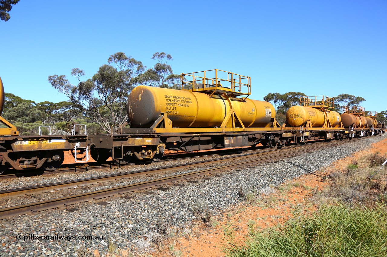161112 3465
Binduli, loaded Hampton acid train 7406 with AQHY 30055 with sulphuric acid tank CSA 0090, originally built by the WAGR Midland Workshops in 1964/66 as a WF type flat waggon, then in 1997, following several recodes and modifications, was one of seventy five waggons converted to the WQH type to carry CSA sulphuric acid tanks between Hampton/Kalgoorlie and Perth/Kwinana. CSA 0090 was built by Vcare Engineering, India for Access Petrotec & Mining Solutions.
Keywords: AQHY-type;AQHY30055;WAGR-Midland-WS;WF-type;WFW-type;WFDY-type;WFDF-type;RFDF-type;WQH-type;