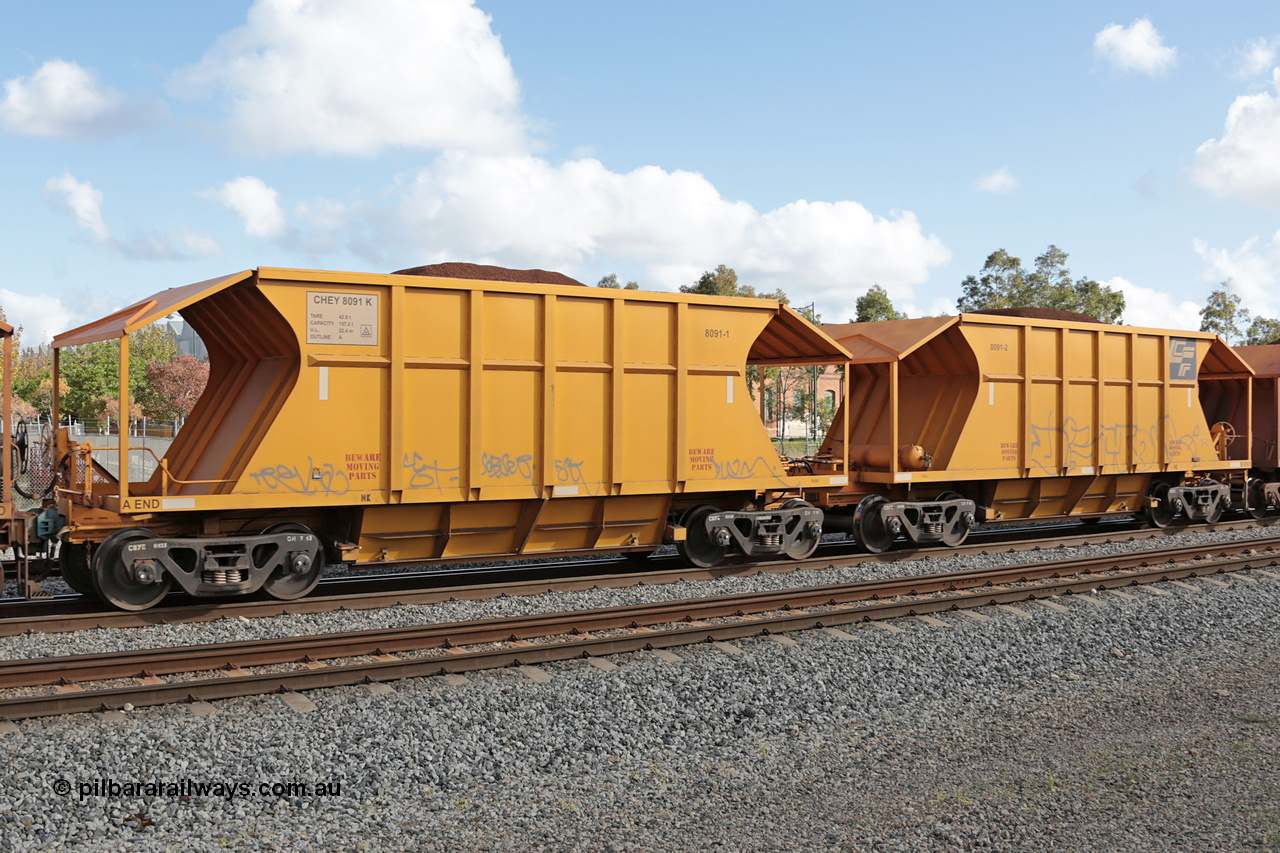 140601 4613
Midland, loaded iron ore train #1030 heading to Kwinana, CFCLA leased CHEY type waggon CHEY 8091 one pair of 120 bar coupled pairs built by Bluebird Rail Operations SA in 2011-12. 1st June 2014.
Keywords: CHEY-type;CHEY8091;Bluebird-Rail-Operations-SA;2011/120-91;