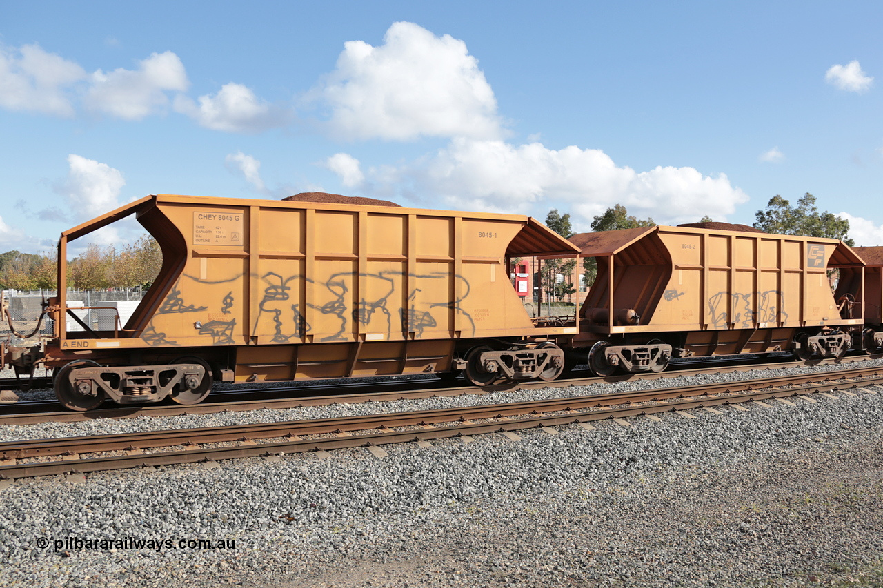 140601 4619
Midland, loaded iron ore train #1030 heading to Kwinana, CFCLA leased CHEY type waggon CHEY 8045 one pair of 120 bar coupled pairs built by Bluebird Rail Operations SA in 2011-12. 1st June 2014.
Keywords: CHEY-type;CHEY8045;Bluebird-Rail-Operations-SA;2011/120-45;