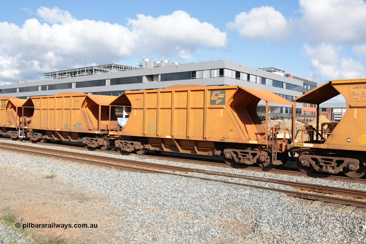 140601 4626
Midland, loaded iron ore train #1030 heading to Kwinana, CFCLA leased CHEY type waggon CHEY 8062 one pair of 120 bar coupled pairs built by Bluebird Rail Operations SA in 2011-12. 1st June 2014.
Keywords: CHEY-type;CHEY8062;Bluebird-Rail-Operations-SA;2011/120-62;