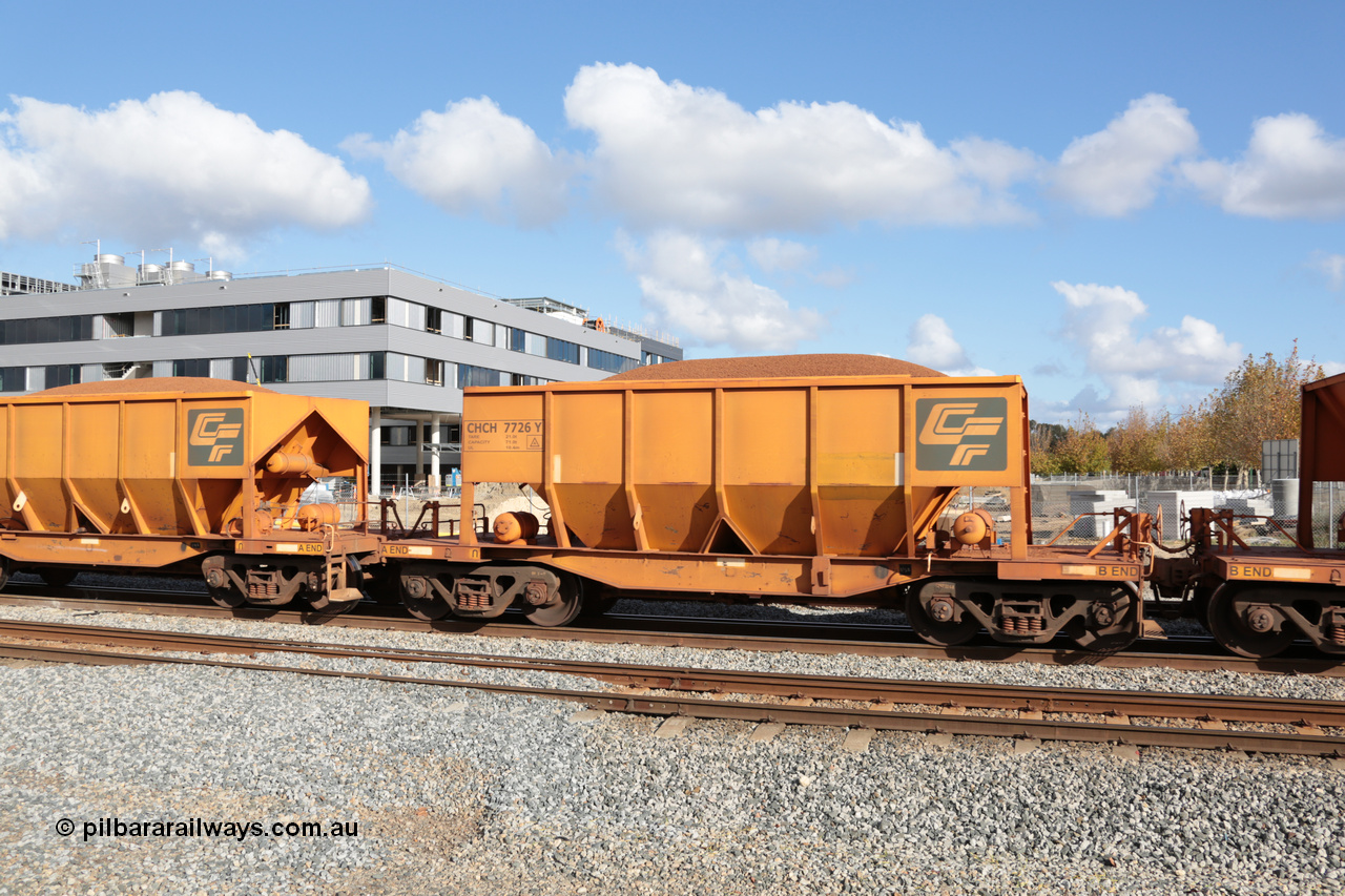 140601 4653
Midland, loaded iron ore train #1030 heading to Kwinana, CFCLA leased CHCH type waggon CHCH 7726 these waggons were rebuilt between 2010 and 2012 by Bluebird Rail Operations SA from former Goldsworthy Mining hopper waggons originally built by Tomlinson WA and Scotts of Ipswich Qld back in the 60's to early 80's. 1st June 2014.
Keywords: CHCH-type;CHCH7726;Bluebird-Rail-Operations-SA;2010/201-126;