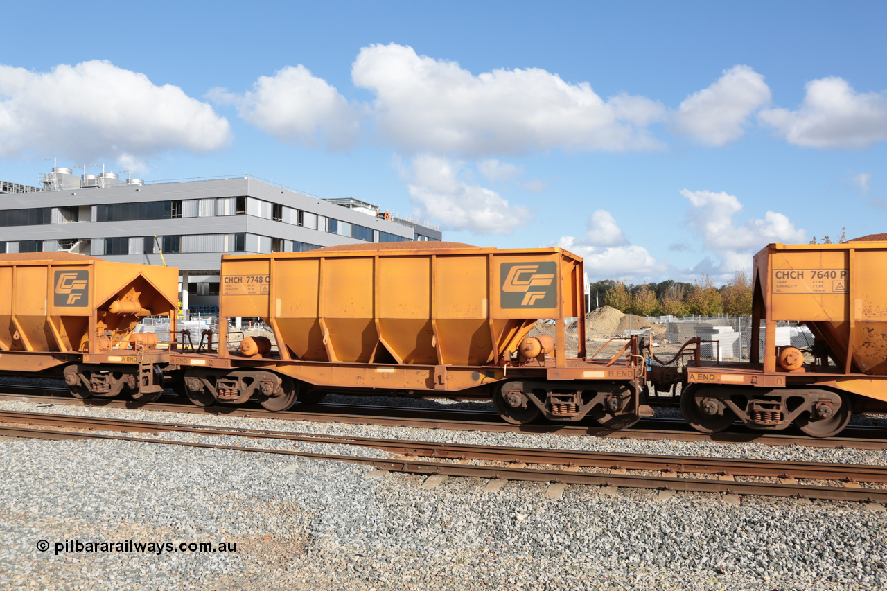 140601 4663
Midland, loaded iron ore train #1030 heading to Kwinana, CFCLA leased CHCH type waggon CHCH 7748 these waggons were rebuilt between 2010 and 2012 by Bluebird Rail Operations SA from former Goldsworthy Mining hopper waggons originally built by Tomlinson WA and Scotts of Ipswich Qld back in the 60's to early 80's. 1st June 2014.
Keywords: CHCH-type;CHCH7748;Bluebird-Rail-Operations-SA;2010/201-148;