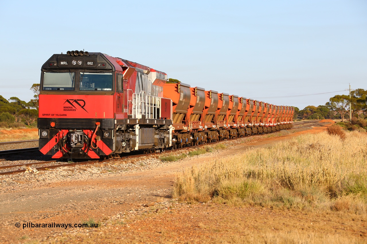 190107 0318
Parkeston, Mineral Resources MRL class loco MRL 002 'Spirit of Yilgarn' with serial R-0113-03/14-505 a UGL Rail Broadmeadow NSW built GE model C44ACi in 2014 stands in the Engineers Siding with a string of eighteen, or nine pairs of MHPY bottom discharge hopper waggons awaiting transfer over to West Kalgoorlie.
Keywords: MRL-class;MRL002;UGL-Rail-NSW;GE;C44ACi;R-0113-03/14-505;