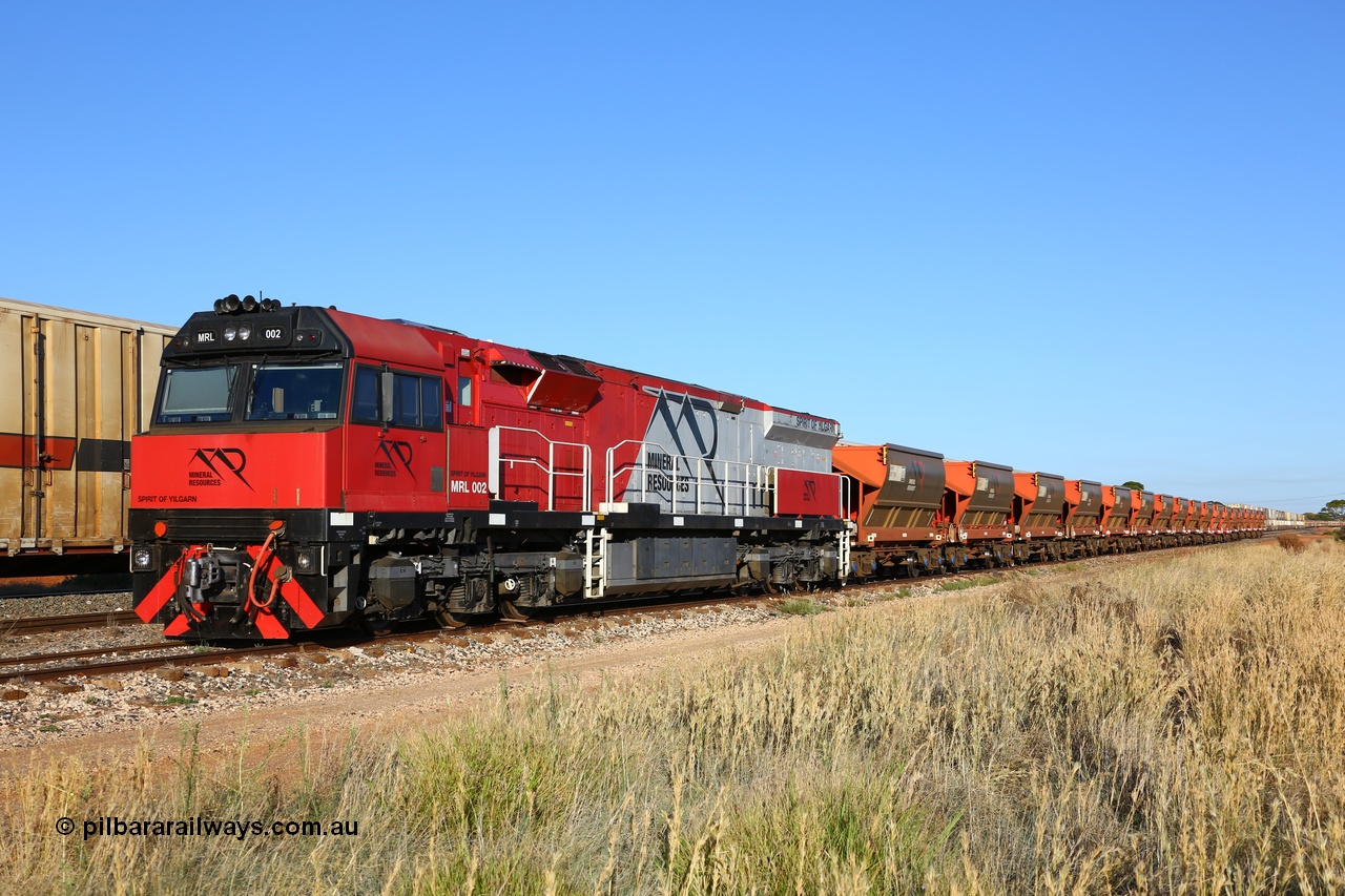 190107 0342
Parkeston, Mineral Resources MRL class loco MRL 002 'Spirit of Yilgarn' with serial R-0113-03/14-505 a UGL Rail Broadmeadow NSW built GE model C44ACi in 2014 stands in the Engineers Siding with a string of eighteen, or nine pairs of MHPY bottom discharge hopper waggons awaiting transfer over to West Kalgoorlie.
Keywords: MRL-class;MRL002;UGL-Rail-NSW;GE;C44ACi;R-0113-03/14-505;