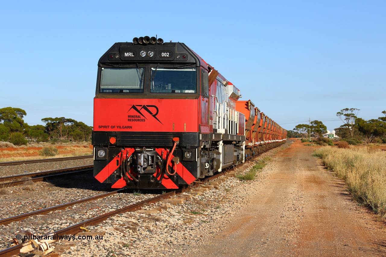 190107 0418
Parkeston, Mineral Resources MRL class loco MRL 002 'Spirit of Yilgarn' with serial R-0113-03/14-505 a UGL Rail Broadmeadow NSW built GE model C44ACi in 2014 stands in the Engineers Siding with a string of eighteen, or nine pairs of MHPY bottom discharge hopper waggons awaiting transfer over to West Kalgoorlie.
Keywords: MRL-class;MRL002;UGL-Rail-NSW;GE;C44ACi;R-0113-03/14-505;