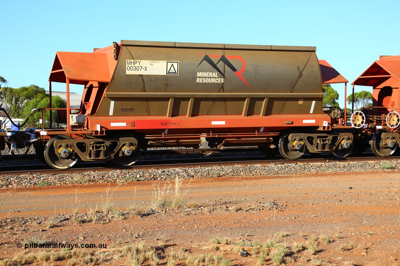 190107 0436
Parkeston, Mineral Resources Ltd MHPY type iron ore waggon MHPY 00307 built by CSR Yangtze Co China in 2014 as a batch of 382 units, these bottom discharge hopper waggons are operated in 'married' pairs.
Keywords: MHPY-type;MHPY00307;2014/382-307;CSR-Yangtze-Rolling-Stock-Co-China;