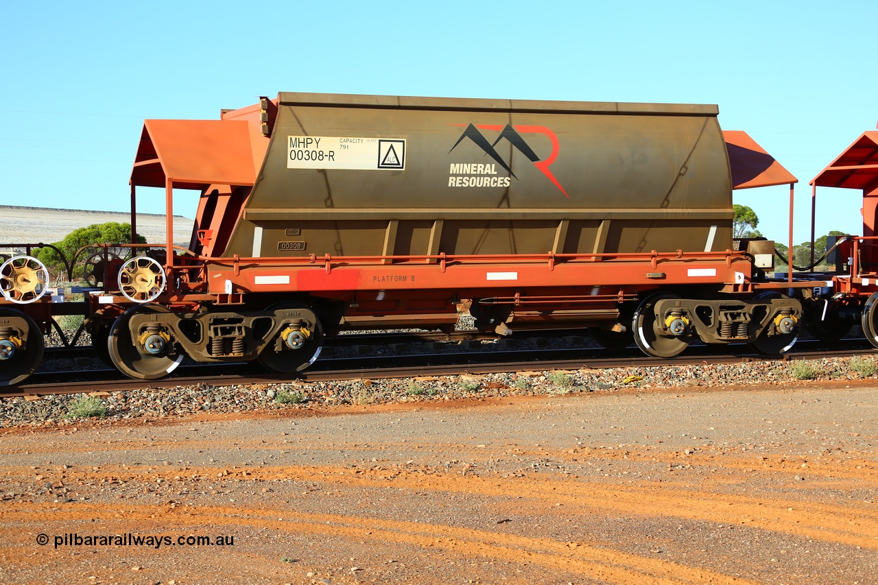 190107 0437
Parkeston, Mineral Resources Ltd MHPY type iron ore waggon MHPY 00308 built by CSR Yangtze Co China in 2014 as a batch of 382 units, these bottom discharge hopper waggons are operated in 'married' pairs.
Keywords: MHPY-type;MHPY00308;2014/382-308;CSR-Yangtze-Rolling-Stock-Co-China;